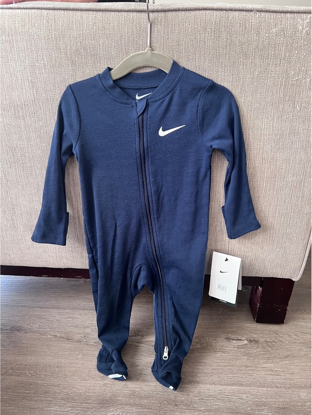 Nike baby navy footed sleeper pajamas